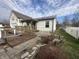 Backyard featuring a multi-level wood deck, small garden area and connection to house at 529 E Jackson St, Martinsville, IN 46151