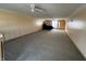 Large bonus room featuring neutral walls, carpet, plenty of natural light, and an expansive layout at 529 E Jackson St, Martinsville, IN 46151
