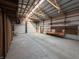 Spacious garage interior featuring ample workspace, tall ceilings, and natural lighting at 529 E Jackson St, Martinsville, IN 46151