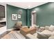 Cozy living room with a modern fireplace, comfortable seating, and elegant decor at 555 N Hamilton Ave, Indianapolis, IN 46201