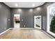 Inviting living room showcases a view into the kitchen, spacious and well-lit at 555 N Hamilton Ave, Indianapolis, IN 46201