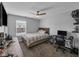 Cozy bedroom setup with a neutral color scheme and a ceiling fan at 5788 Terracotta Trce, McCordsville, IN 46055