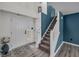 Welcoming foyer with a staircase, hardwood floors, and a view of the front door at 5788 Terracotta Trce, McCordsville, IN 46055