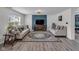 Inviting living area with stylish sofas, a decorative rug, and an entertainment center at 5788 Terracotta Trce, McCordsville, IN 46055