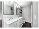 Modern bathroom featuring double sinks and a marble countertop at 6036 Terrytown Pkwy, Indianapolis, IN 46254