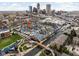 Aerial view of a neighborhood with a canal running through it and the downtown skyline in the background at 634 N Senate Ave, Indianapolis, IN 46202