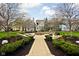 Beautifully landscaped community with a central courtyard, fire pit, and inviting seating areas at 634 N Senate Ave, Indianapolis, IN 46202