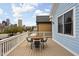 Enjoy scenic city views from this spacious deck with dining area, perfect for outdoor entertaining at 634 N Senate Ave, Indianapolis, IN 46202