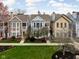 Beautiful homes with inviting front yards and well-maintained landscaping, enhancing curb appeal at 634 N Senate Ave, Indianapolis, IN 46202