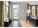Welcoming foyer with tiled entryway, natural light, and stylish decor at 634 N Senate Ave, Indianapolis, IN 46202