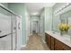 Bathroom with a double sink vanity, walk-in shower, and easy access to the bedroom at 639 Nuttal St, Westfield, IN 46074
