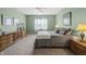 Cozy bedroom with neutral décor, a ceiling fan, and natural light filtering through the window at 639 Nuttal St, Westfield, IN 46074
