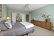Light-filled bedroom featuring a calm color palette, a ceiling fan, and ample storage space at 639 Nuttal St, Westfield, IN 46074