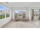 Inviting living room with large windows offering a view of the well-manicured neighborhood at 639 Nuttal St, Westfield, IN 46074