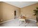 Office space with neutral walls, a small desk, and an open doorway to another area of the home at 639 Nuttal St, Westfield, IN 46074