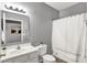 Bathroom featuring a vanity, a mirror, and a shower tub with a white shower curtain at 661 Overcup St, Westfield, IN 46074