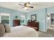 Bright bedroom with natural light and classic wood furniture at 661 Overcup St, Westfield, IN 46074