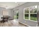 Cozy dining area with large windows offering backyard views at 661 Overcup St, Westfield, IN 46074