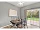 Charming dining area with sliding glass doors providing outdoor access at 661 Overcup St, Westfield, IN 46074