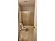 Standard bathroom featuring a shower-tub combination with patterned glass doors and toilet at 7497 Grandview Dr, Avon, IN 46123