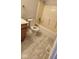 Standard full bathroom, featuring a tub-shower combination and toilet with neutral tile flooring at 7497 Grandview Dr, Avon, IN 46123