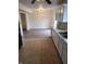 Spacious dining area, and hardwood floors connecting to the kitchen with neutral paint at 7497 Grandview Dr, Avon, IN 46123