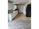 Kitchen features white cabinets, tile floors, and updated appliances at 7497 Grandview Dr, Avon, IN 46123