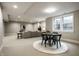 Finished basement with an open floor plan, plush carpeting, recessed lighting, and ample room for entertaining at 768 Trailside Dr, Carmel, IN 46032