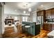 Open-concept kitchen flows seamlessly into the living area, ideal for entertaining guests in style at 768 Trailside Dr, Carmel, IN 46032