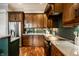 Gourmet kitchen boasts stainless steel appliances, granite countertops, and custom cabinetry for a luxury feel at 768 Trailside Dr, Carmel, IN 46032