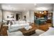Inviting living room showcases an open floor plan with modern finishes flowing into the dining room and kitchen at 768 Trailside Dr, Carmel, IN 46032