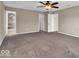 Large main bedroom featuring carpet and multiple entry points at 7854 Crooked Meadows Dr, Indianapolis, IN 46268