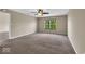 Bedroom with carpeted flooring, a window and a ceiling fan at 7854 Crooked Meadows Dr, Indianapolis, IN 46268