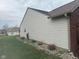 Home exterior with siding and stone landscaping at 7916 Begonia Ct, Indianapolis, IN 46113