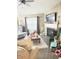Bright living room featuring a fireplace, natural light and an inviting place for relaxation at 7916 Begonia Ct, Indianapolis, IN 46113