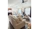 Spacious living area with a view of the kitchen and dining space, perfect for entertaining guests at 7916 Begonia Ct, Indianapolis, IN 46113