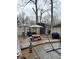 Inviting backyard features a patio, picnic table, grilling area and storage shed at 8224 Claridge Rd, Indianapolis, IN 46260