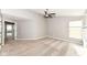 Bedroom featuring neutral walls and carpet with a large window view at 10516 Beacon Ln, Indianapolis, IN 46256