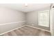 Bedroom with wainscotting and a closet at 10516 Beacon Ln, Indianapolis, IN 46256