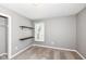 Bedroom with a window and two wall mounted shelves at 10516 Beacon Ln, Indianapolis, IN 46256