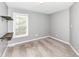 Bedroom with a window and wall mounted shelves at 10516 Beacon Ln, Indianapolis, IN 46256