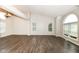 Spacious living room boasts hardwood floors, large windows, and vaulted ceilings at 10516 Beacon Ln, Indianapolis, IN 46256