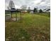 Large backyard with a gazebo, grill, and shed at 10711 Regis Ct, Indianapolis, IN 46239