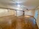 Spacious basement with painted concrete floors and utility access at 10711 Regis Ct, Indianapolis, IN 46239