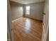 Bedroom featuring hard surface floors, a neutral color palette and bright window with lots of light at 10711 Regis Ct, Indianapolis, IN 46239
