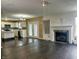 Spacious living room with fireplace and open layout connected to the kitchen, perfect for entertaining at 10711 Regis Ct, Indianapolis, IN 46239