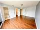 Large main bedroom with wood floors, closet, and en-suite bathroom with lots of space at 10711 Regis Ct, Indianapolis, IN 46239
