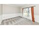 Bedroom features neutral walls, plush carpet, and window with elegant drapes at 10944 Echo Trl, Indianapolis, IN 46236