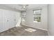 Bright bedroom offers double windows, a ceiling fan and a double door closet for all your storage needs at 10944 Echo Trl, Indianapolis, IN 46236
