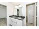 Elegant bathroom featuring a double vanity, a large mirror, and modern fixtures, offering a luxurious feel at 11392 Gammel Pl, Fishers, IN 46040